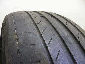 tyre tread worn on outside edge